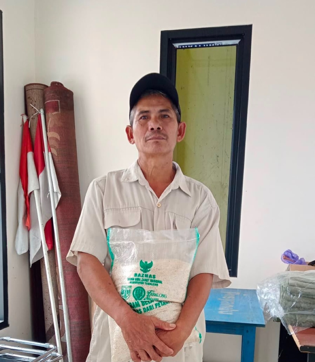 Sebanyak 22 KPM Terima bantuan Beras Program Bela Tani yang disalurkan di Desa Mangkupum