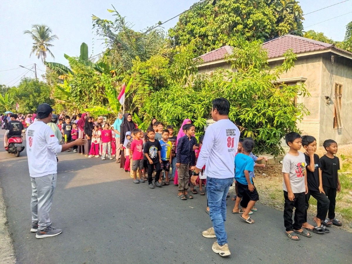 Meriahkan HUT RI ke-81, Pemdes Pulau Ku'u Sukses Gelar Jalan Sehat Berhadiah